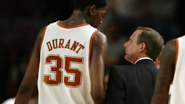 Nov 16, 2006; New York, NY, USA; Texas Longhorns head coach Rick Barnes talks with guard (35) Kevin Durant during the 2K Sports College Hoops Classic game against the Michigan State Spartans.
