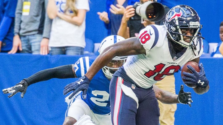 Sep 30, 2018; Indianapolis, IN, USA; Houston Texans wide receiver Sammie Coates (18) runs with the ball after a catch while Indianapolis Colts cornerback Nate Hairston (27) defends in the second half at Lucas Oil Stadium. Mandatory Credit: Trevor Ruszkowski-Imagn Images