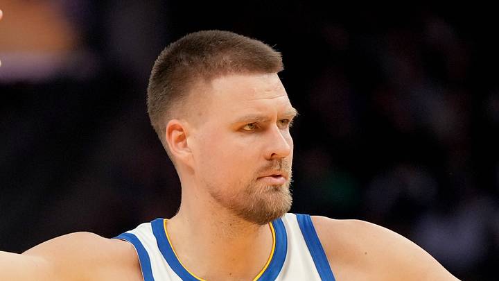 Golden State Warriors forward Kristaps Porzingis (7) reacts after being fouled against the Minnesota Timberwolves in the fourth quarter at the Chase Center on March 13, 2026.