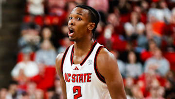 Feb 1, 2025; Raleigh, North Carolina, USA; North Carolina State Wolfpack guard Paul McNeil (2) reacts to his point ball during the first half of the game against the Clemson Tigers at Lenovo Center. Mandatory Credit: Jaylynn Nash-Imagn Images
