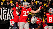 Ohio State Buckeyes defensive end Jack Sawyer (33) appeals for a flag from the official during the second half of the NCAA football game against the Michigan Wolverines at Ohio Stadium in Columbus on Saturday, Nov. 30, 2024. Michigan won 13-10.