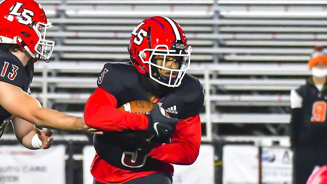 Gi'Bran Payne (3) of La Salle takes a handoff from Zach Branam (13) against Anderson during a OHSAA playoff game Friday, Oct. 30, 2020 at La Salle High School

Anderson La Salle20201030 0014