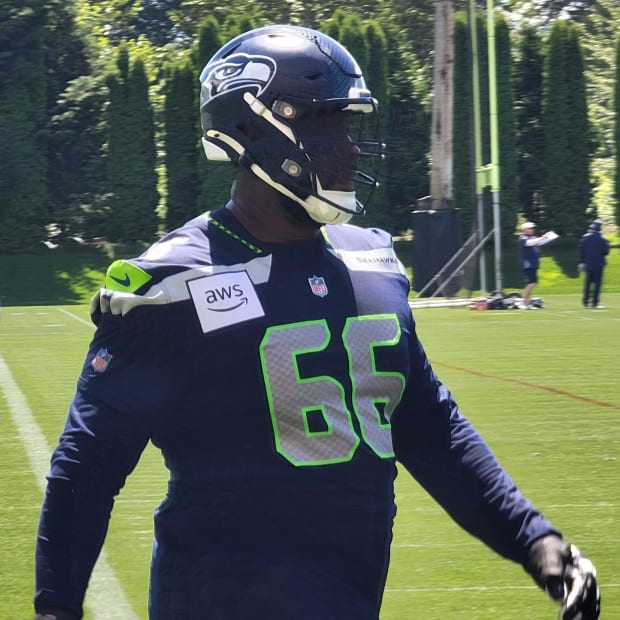 Seahawks guard McClendon Curtis looks on during a blocking drill at mandatory minicamp.