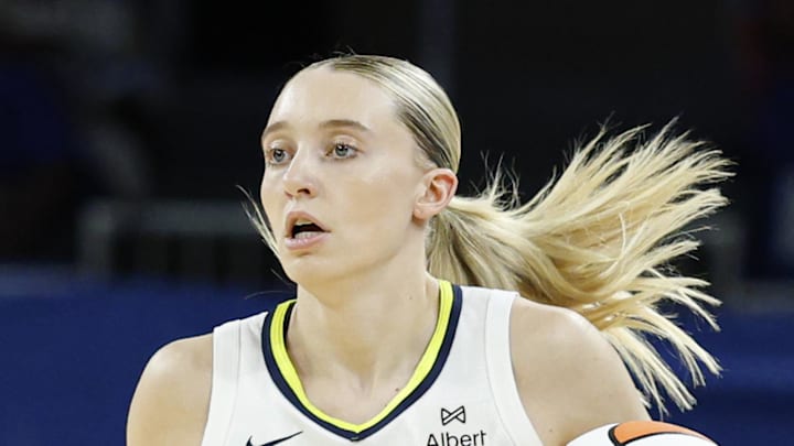 Dallas Wings guard Paige Bueckers brings the ball up court against the Chicago Sky.