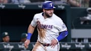 Apr 29, 2025; Arlington, Texas, USA; Texas Rangers first base Jake Burger (21) scores a run during the third inning against the Oakland Athletics at Globe Life Field.
