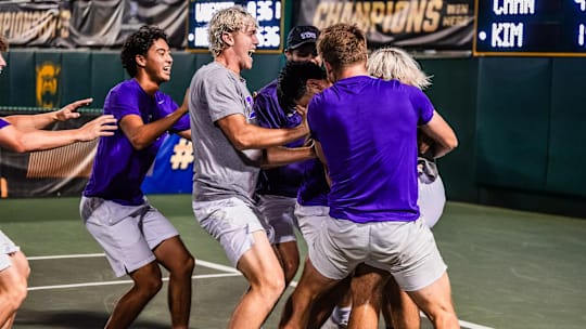 TCU Men's Tennis celebrates after beating Virginia in the national quarterfinals on Friday. They will play Texas in the semifinals on Saturday.