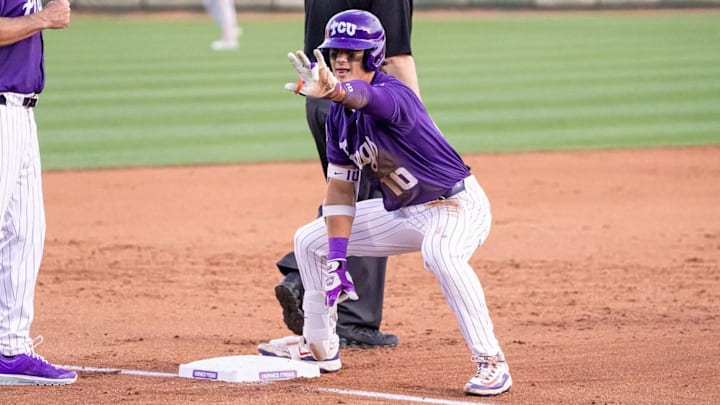 Sawyer Strosnider celebrates with the TCU dugout after a triple. Sawyer Strosnider celebrates with the TCU dugout after a triple.