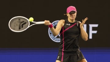 Mar 24, 2024; Miami Gardens, FL, USA; Iga Swiatek (POL) hits a forehand against Linda Noskova (CZE) (not pictured) on day seven of the Miami Open at Hard Rock Stadium. Mandatory Credit: Geoff Burke-USA TODAY Sports