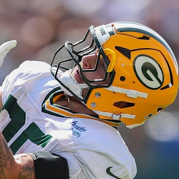 Green Bay Packers tight end Tucker Kraft (85) catches a pass during training camp.