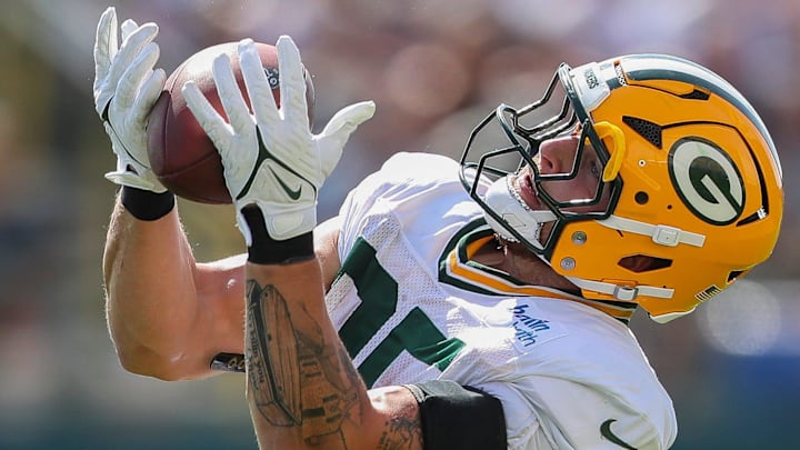 Green Bay Packers tight end Tucker Kraft (85) catches a pass during training camp.