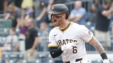Aug 25, 2024; Pittsburgh, Pennsylvania, USA;  Pittsburgh Pirates catcher Yasmani Grandal (6) reacts after hitting a game winning walk-off two run home run against the Cincinnati Reds during the ninth inning at PNC Park. Mandatory Credit: Charles LeClaire-Imagn Images