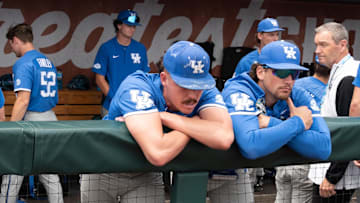 Jun 19, 2024; Omaha, NE, USA;  Kentucky Wildcats pitcher Cameron O'Brien (10) and first baseman Ryan Nicholson (25) look over the field after the loss against the Florida Gators at Charles Schwab Field Omaha. Mandatory Credit: Steven Branscombe-Imagn Images