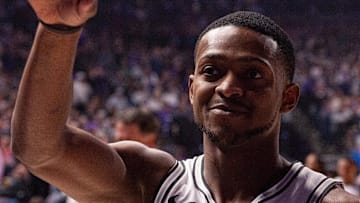 Mar 7, 2025; Sacramento, California, USA; San Antonio Spurs guard De'Aaron Fox (4) waves to the crowd during pregame introductions before the game against the Sacramento Kings at Golden 1 Center.
