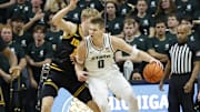 Michigan State Spartans forward Jaxon Kohler (0) dribbles the ball in the post against the Iowa Hawkeyes on Tuesday, Dec. 2, 2025, at the Breslin Center. 