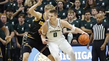 Michigan State Spartans forward Jaxon Kohler (0) dribbles the ball in the post against the Iowa Hawkeyes on Tuesday, Dec. 2, 2025, at the Breslin Center. 