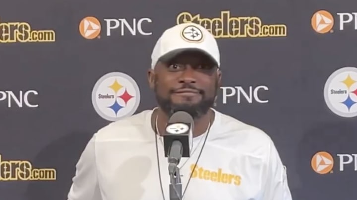 Mike Tomlin reacts to a question.