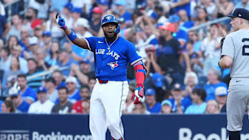 Oct 4, 2025; Toronto, Ontario, CAN; Toronto Blue Jays first baseman Vladimir Guerrero Jr. (27) celebrates after a single in the third inning against the New York Yankees during game one of the ALDS round for the 2025 MLB playoffs at Rogers Centre. 