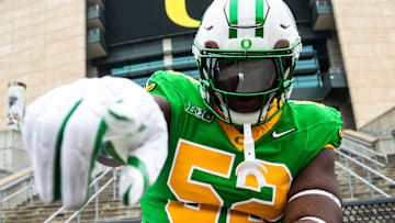 Defensive tackle A'Mauri Washington models Oregon Duck Football's game against the Minnesota Golden Gopher.