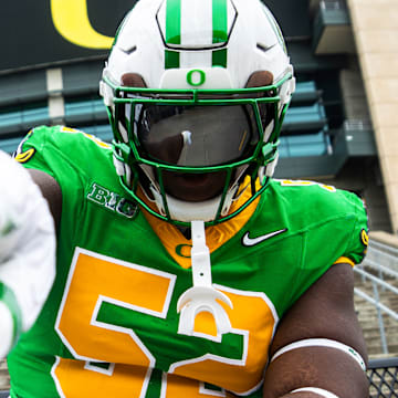 Defensive tackle A'Mauri Washington models Oregon Duck Football's game against the Minnesota Golden Gopher.