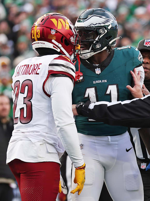 Philadelphia Eagles quarterback Jalen Hurts (1) talks with Washington Commanders cornerback Marshon Lattimore (23). Philadelphia Eagles quarterback Jalen Hurts (1) talks with Washington Commanders cornerback Marshon Lattimore (23).