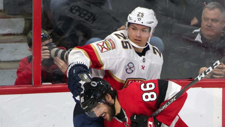 Mar 28, 2019; Ottawa, Ontario, CAN; Florida Panthers defenseman Brady Keeper (25) checks Ottawa Senators defenseman Christian Wolanin (86) in the third period at the Canadian Tire Centre. Mandatory Credit: Marc DesRosiers-Imagn Images Mar 28, 2019; Ottawa, Ontario, CAN; Florida Panthers defenseman Brady Keeper (25) checks Ottawa Senators defenseman Christian Wolanin (86) in the third period at the Canadian Tire Centre. Mandatory Credit: Marc DesRosiers-Imagn Images