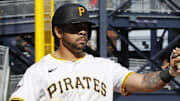 Apr 20, 2025; Pittsburgh, Pennsylvania, USA;  Pittsburgh Pirates left fielder Tommy Pham (28) and first baseman Enmanuel Valdez (48) celebrate after both players scored runs against the Cleveland Guardians during the ninth inning at PNC Park. 