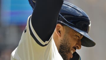 Jul 7, 2024; Minneapolis, Minnesota, USA; Minnesota Twins' Carlos Correa (4) holds up his hand after getting hit by a pitch by the Houston Astros in the first inning at Target Field. Correa left the game. Mandatory Credit: Bruce Kluckhohn-USA TODAY Sports