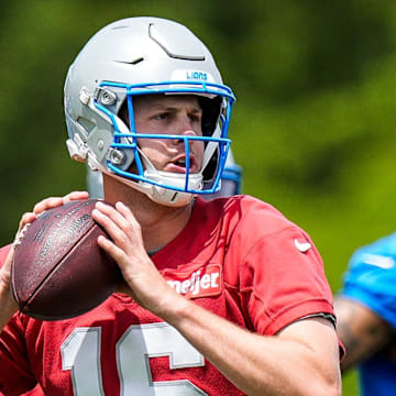 Detroit Lions quarterback Jared Goff (16) practices during OTAs at team's Performance Center in Allen Park 