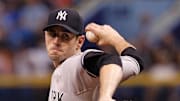 Sep 17, 2014; St. Petersburg, FL, USA; New York Yankees starting pitcher Brandon McCarthy (38) throws a pitch against the Tampa Bay Rays  at Tropicana Field. 