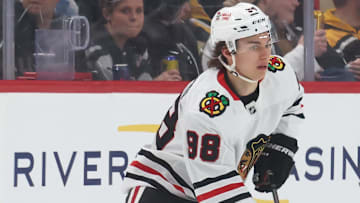 Apr 8, 2025; Pittsburgh, Pennsylvania, USA;  Chicago Blackhawks center Connor Bedard (98) skates with the puck against the Pittsburgh Penguins during the first period at PPG Paints Arena. Mandatory Credit: Charles LeClaire-Imagn Images