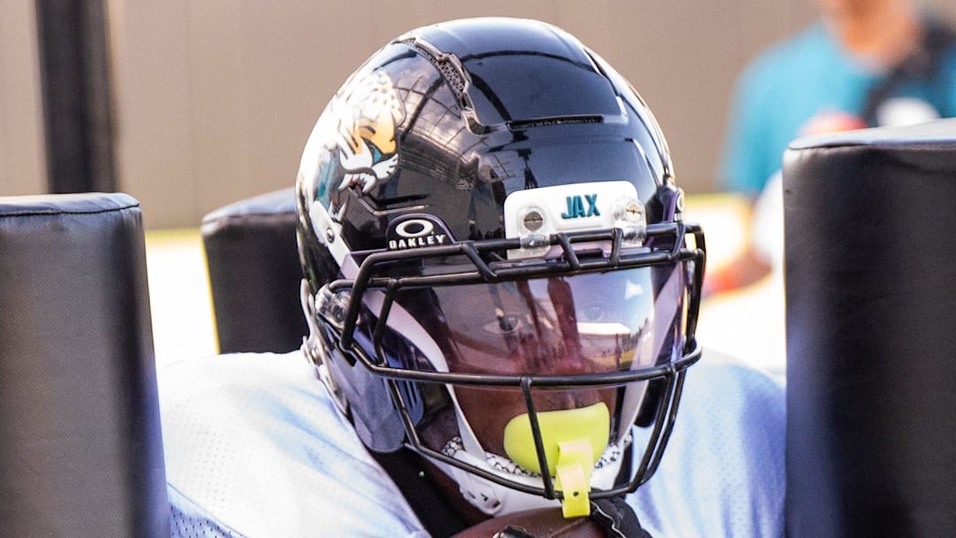 Jacksonville Jaguars running back Travis Etienne Jr. (1) runs through a gauntlet during the Jaguars 14th NFL training camp session at Miller Electric Center Tuesday August 12, 2025 in Jacksonville, Fla. The Jaguars travel to New Orleans to play the Saints this Sunday in their second preseason game. [Doug Engle/Florida Times-Union]