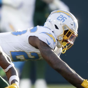 Los Angeles Chargers cornerback Asante Samuel Jr. (26) in called for pass interference on a throw to Packers receiver Dontayvion Wicks in 2023.