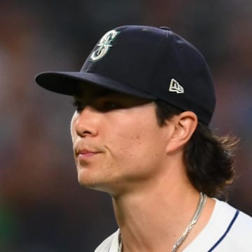 Seattle Mariners starting pitcher Bryan Woo (22) reacts to the final out against the Chicago White Sox during the seventh inning at T-Mobile Park on Aug 5. 