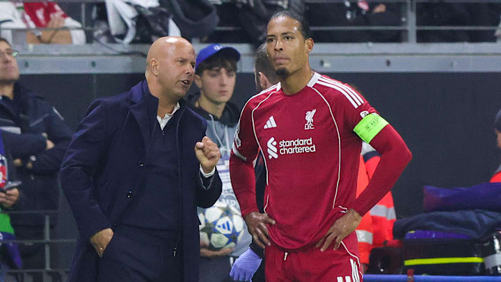 Arne Slot (left) and Virgil van Dijk (right) had different opinions.