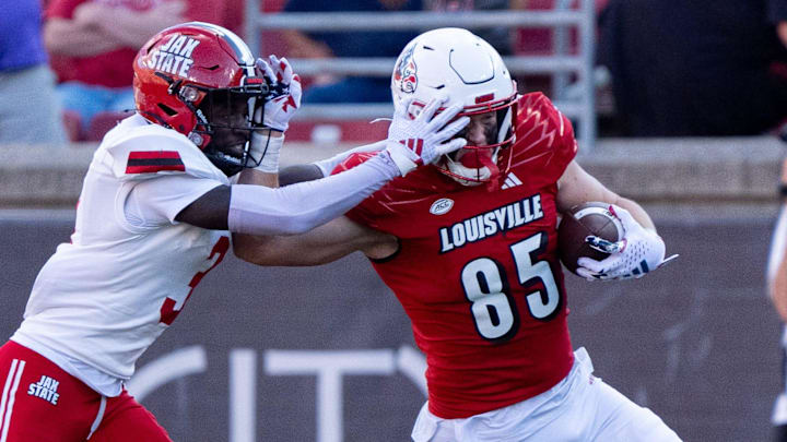 Louisville Cardinals tight end Nate Kurisky (85) pushes Jacksonville State Gamecocks cornerback Kenney Solomon II (3) off as he runs down the field during their game on Saturday, Sept. 7, 2024 at L&N Federal Credit Union Stadium in Louisville, Ky.