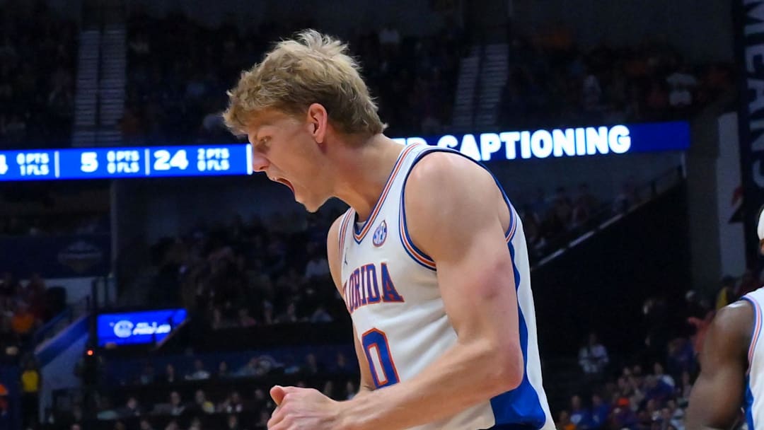 Mar 13, 2026; Nashville, TN, USA; Florida Gators forward Thomas Haugh (10) reacts after getting fouled by Kentucky Wildcats forward Andrija Jelavic (4) during the first half at Bridgestone Arena. Mandatory Credit: Steve Roberts-Imagn Images Mar 13, 2026; Nashville, TN, USA; Florida Gators forward Thomas Haugh (10) reacts after getting fouled by Kentucky Wildcats forward Andrija Jelavic (4) during the first half at Bridgestone Arena. Mandatory Credit: Steve Roberts-Imagn Images