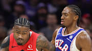 Toronto Raptors guard Jamal Shead dribbles the ball against Philadelphia 76ers guard Tyrese Maxey.