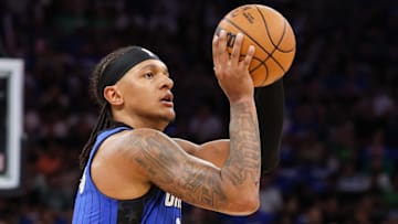 Orlando Magic forward Paolo Banchero (5) shoots a three point shot against the Boston Celtics in the first quarter during game four of first round for the 2025 NBA Playoffs at Kia Center.