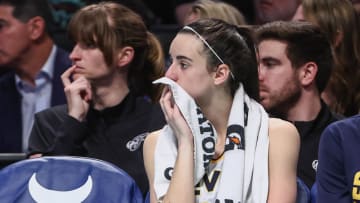 Jun 2, 2024; Brooklyn, New York, USA;  Indiana Fever guard Caitlin Clark (22) watches from the bench in the fourth quarter against the New York Liberty at Barclays Center