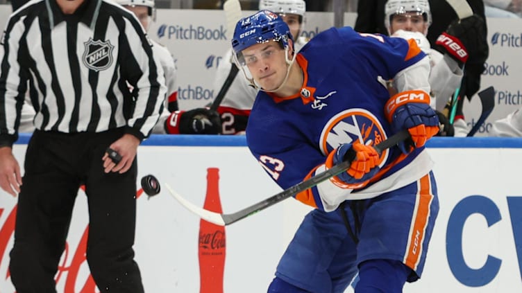 Mar 16, 2024; Elmont, New York, USA;  New York Islanders center Mathew Barzal (13) makes a pass