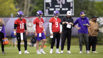 J.J. McCarthy (9) next to Nick Mullens (12) and Jaren Hall (16) at Vikings offseason practice. 