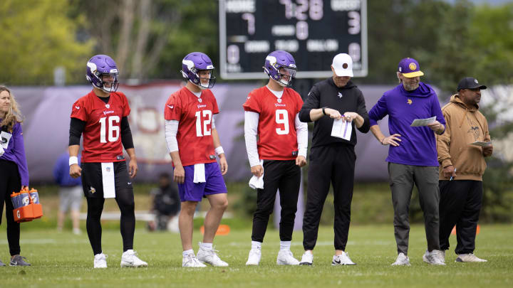 J.J. McCarthy (9) next to Nick Mullens (12) and Jaren Hall (16) at Vikings offseason practice. 