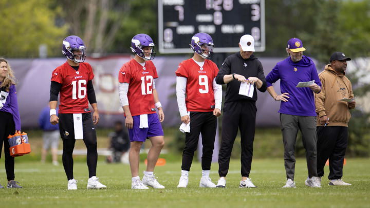 J.J. McCarthy (9) next to Nick Mullens (12) and Jaren Hall (16) at Vikings offseason practice. 