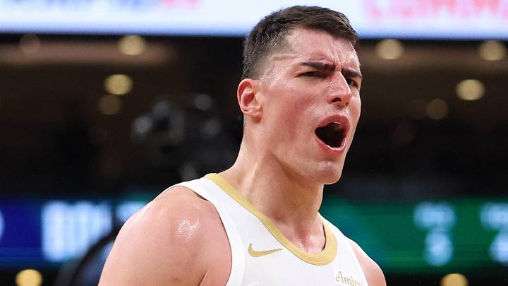 Apr 12, 2026; Boston, Massachusetts, USA; Boston Celtics forward Luka Garza (52) reacts during the second half against the Orlando Magic at TD Garden. Mandatory Credit: Paul Rutherford-Imagn Images