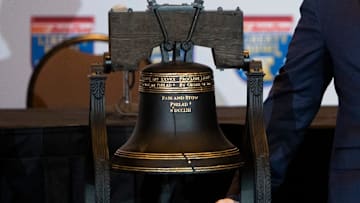Memphis head coach Ryan Silverfield poses for a photo next to the AutoZone Liberty Bowl Trophy after a press conference in Downtown Memphis, Tenn., on Thursday, December 28, 2023. Memphis will play Iowa State University in the AutoZone Liberty Bowl on Friday.