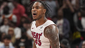 Apr 18, 2025; Atlanta, Georgia, USA; Miami Heat guard Davion Mitchell (45) reacts after the Heat defeat the Atlanta Hawks in overtime at State Farm Arena. Mandatory Credit: Dale Zanine-Imagn Images