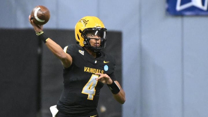 Dec 2, 2023; Moscow, ID, USA; Idaho Vandals quarterback Gevani McCoy (4) throws a pass against the Southern Illinois Salukis in the first half at Kibble Dome. Mandatory Credit: James Snook-USA TODAY Sports