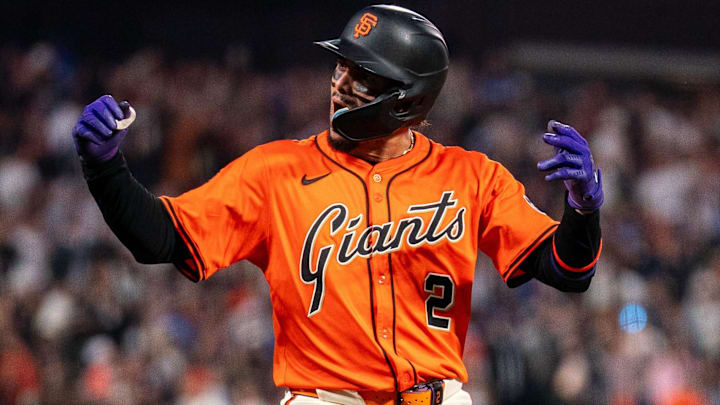 Jul 11, 2025; San Francisco, California, USA; San Francisco Giants shortstop Willy Adames (2) celebrates on base after hitting a two run triple against the Los Angeles Dodgers during the fifth inning at Oracle Park Jul 11, 2025; San Francisco, California, USA; San Francisco Giants shortstop Willy Adames (2) celebrates on base after hitting a two run triple against the Los Angeles Dodgers during the fifth inning at Oracle Park