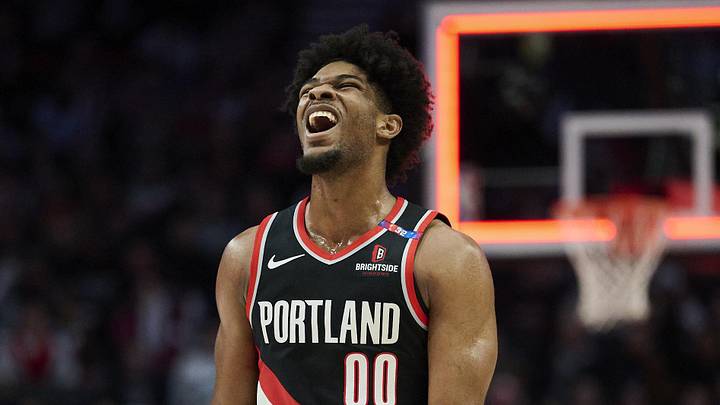 Feb 22, 2025; Portland, Oregon, USA; Portland Trail Blazers guard Scoot Henderson (00) reacts after missing a three point basket during the second half against the Charlotte Hornets at Moda Center. Mandatory Credit: Troy Wayrynen-Imagn Images