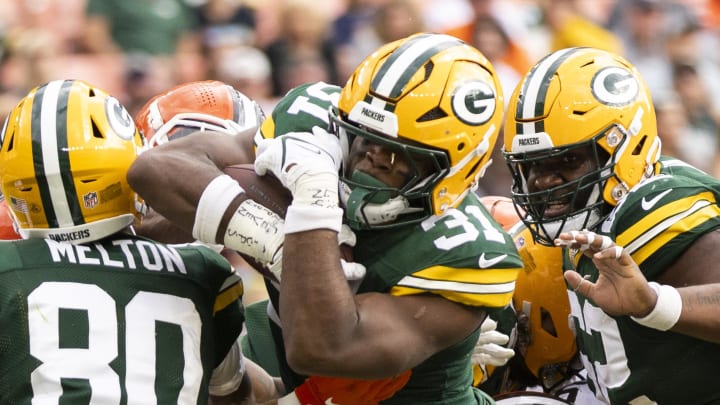 Green Bay Packers running back Emanuel Wilson scores against the Cleveland Browns on Saturday.